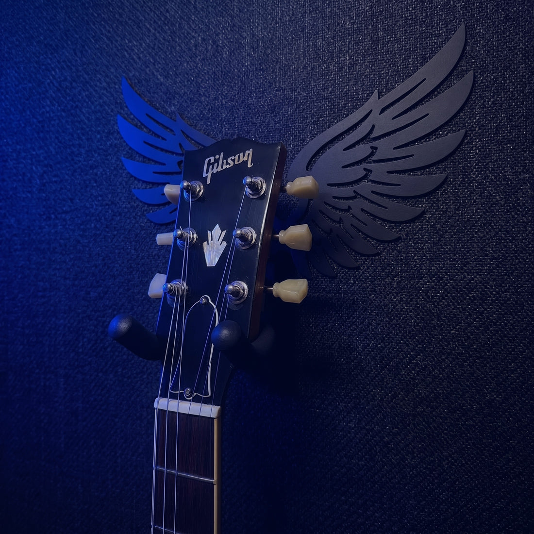 Angel Wing Guitar Hanger on the wall